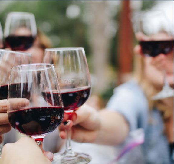 Cheering with wine glasses